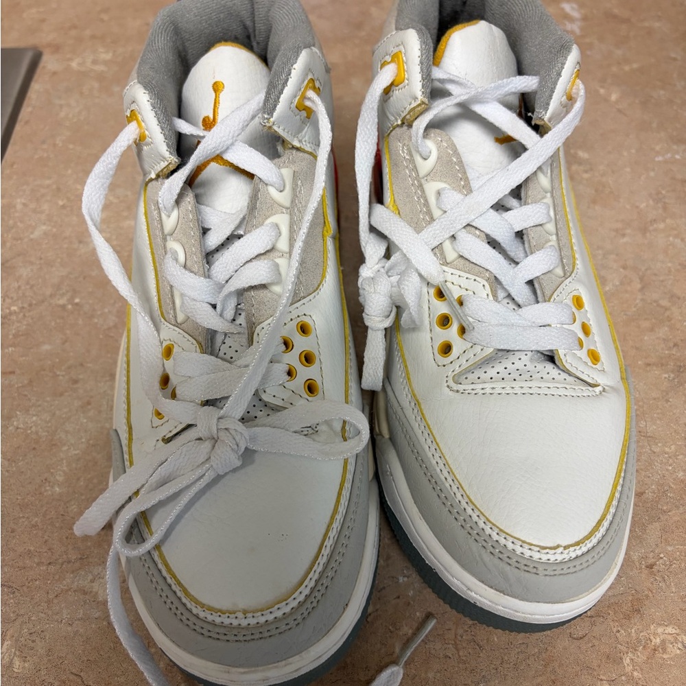 Jordan White and Yellow High-Top Sneakers